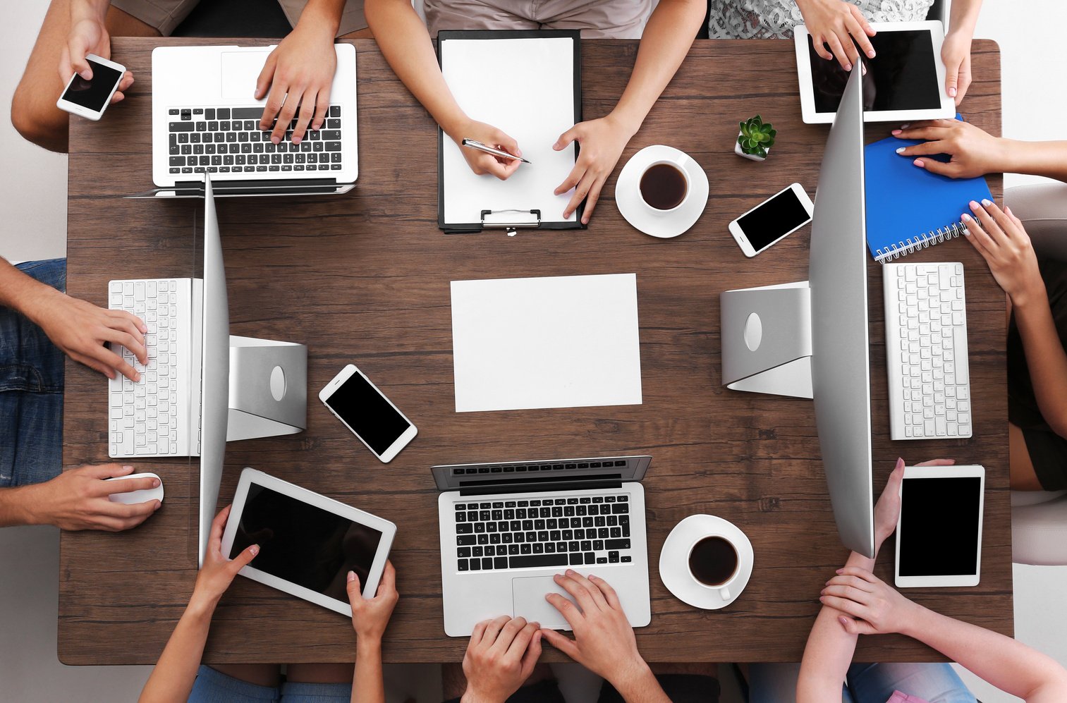 Group of People Working on Their Computers and Gadgets 